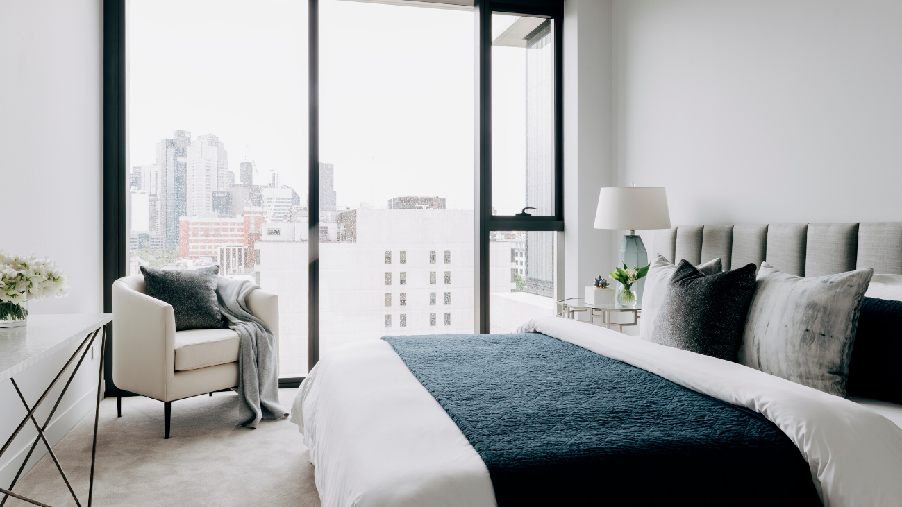 Bedroom with floor to ceiling windows