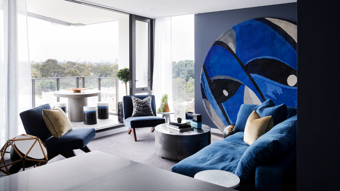Apartment living room with blue art