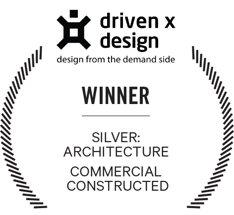 driven x design commercial constructed architecture award logo