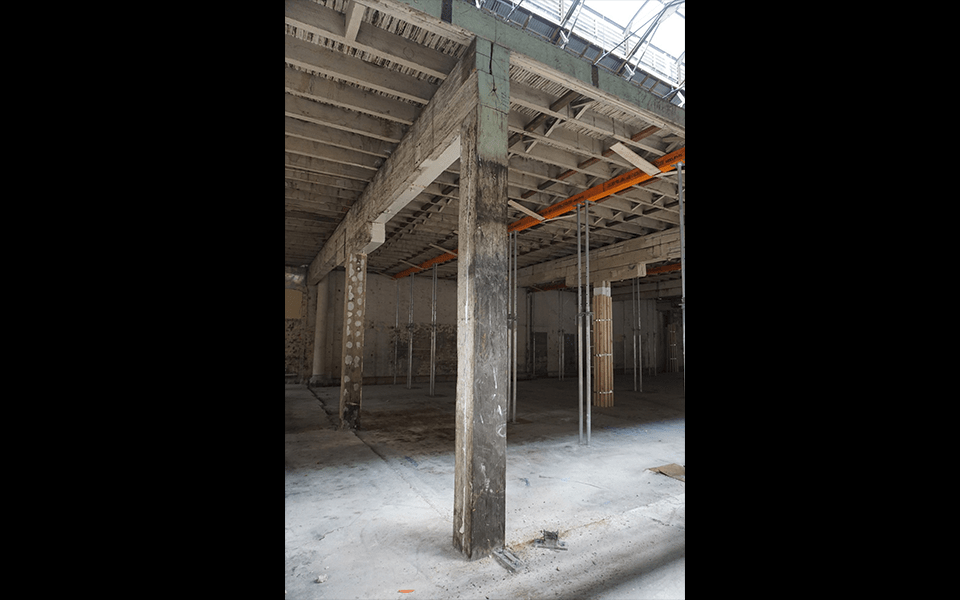 Timber columns supporting the canteen mezzanine in Bay 5. 