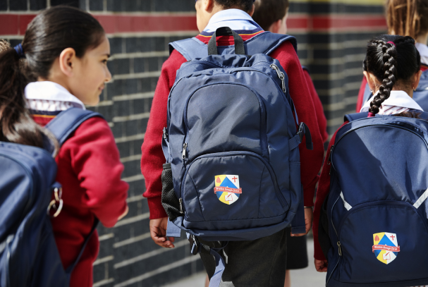 School children with backpacks